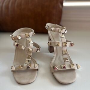 Gently worn spiked heeled sandals